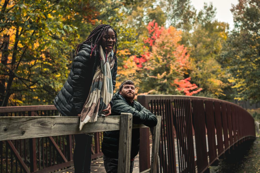 Two people on a bridge at Days River