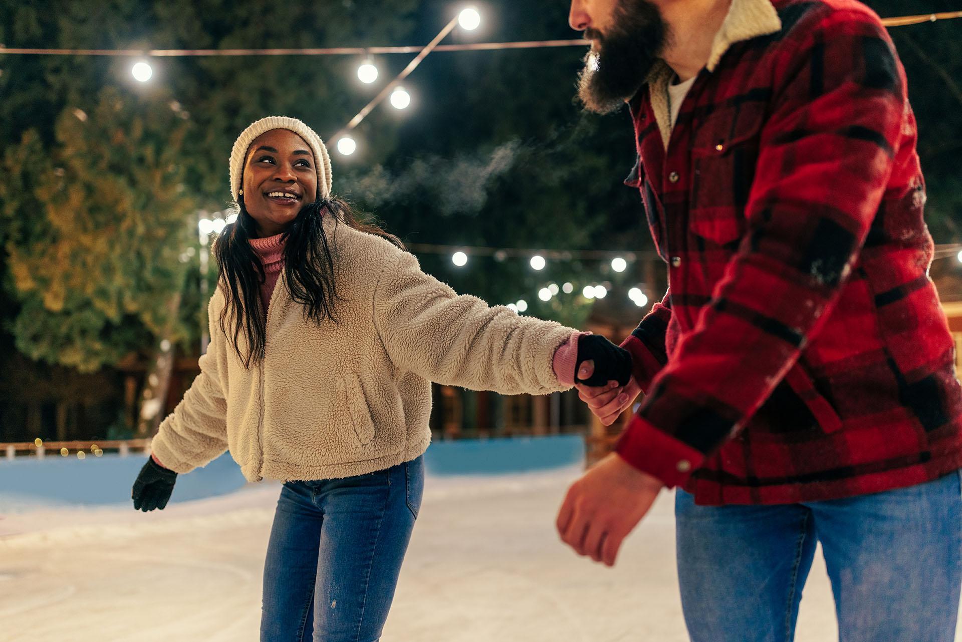 a couple ice skating