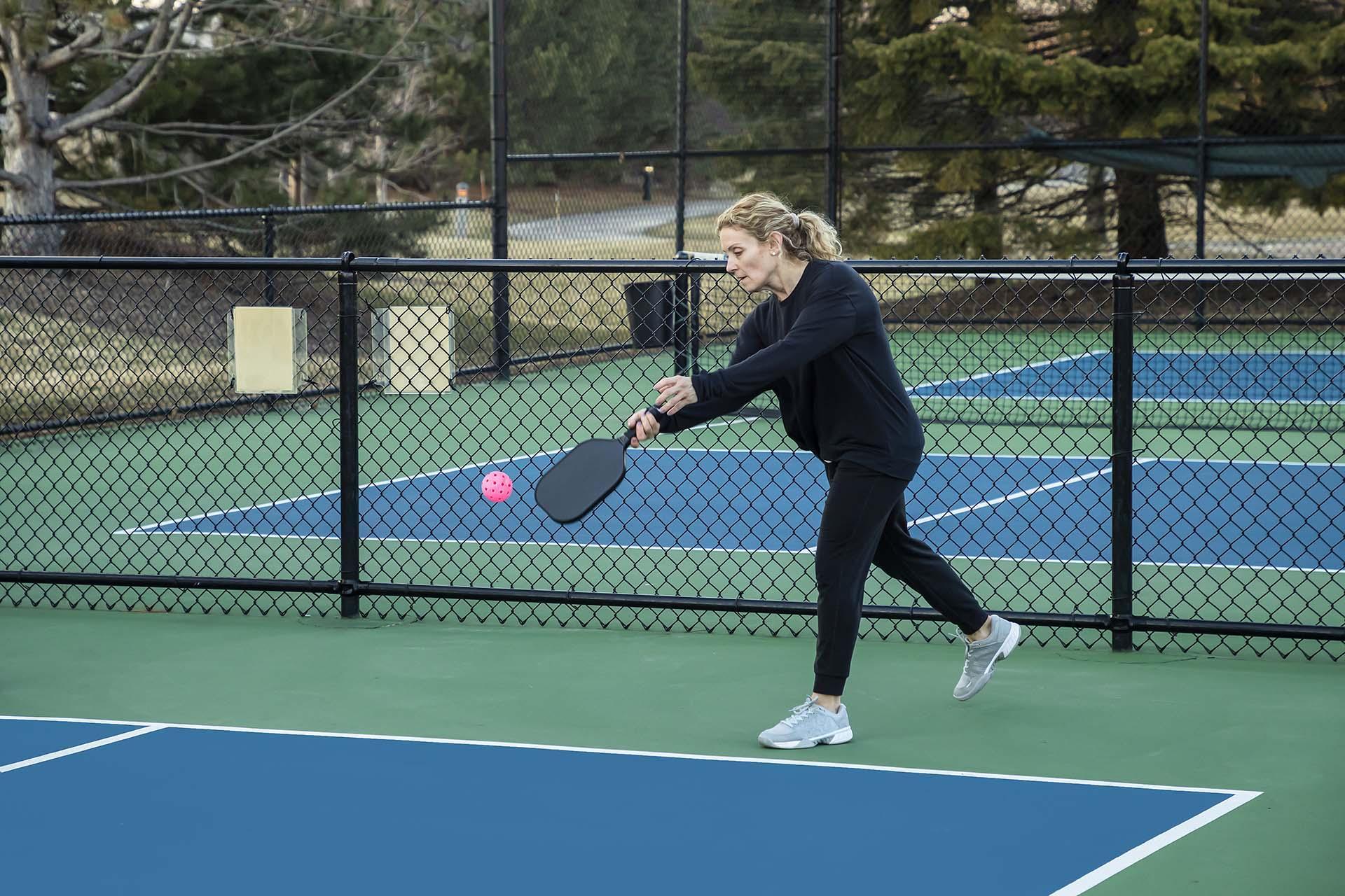 A person playing pickleball.