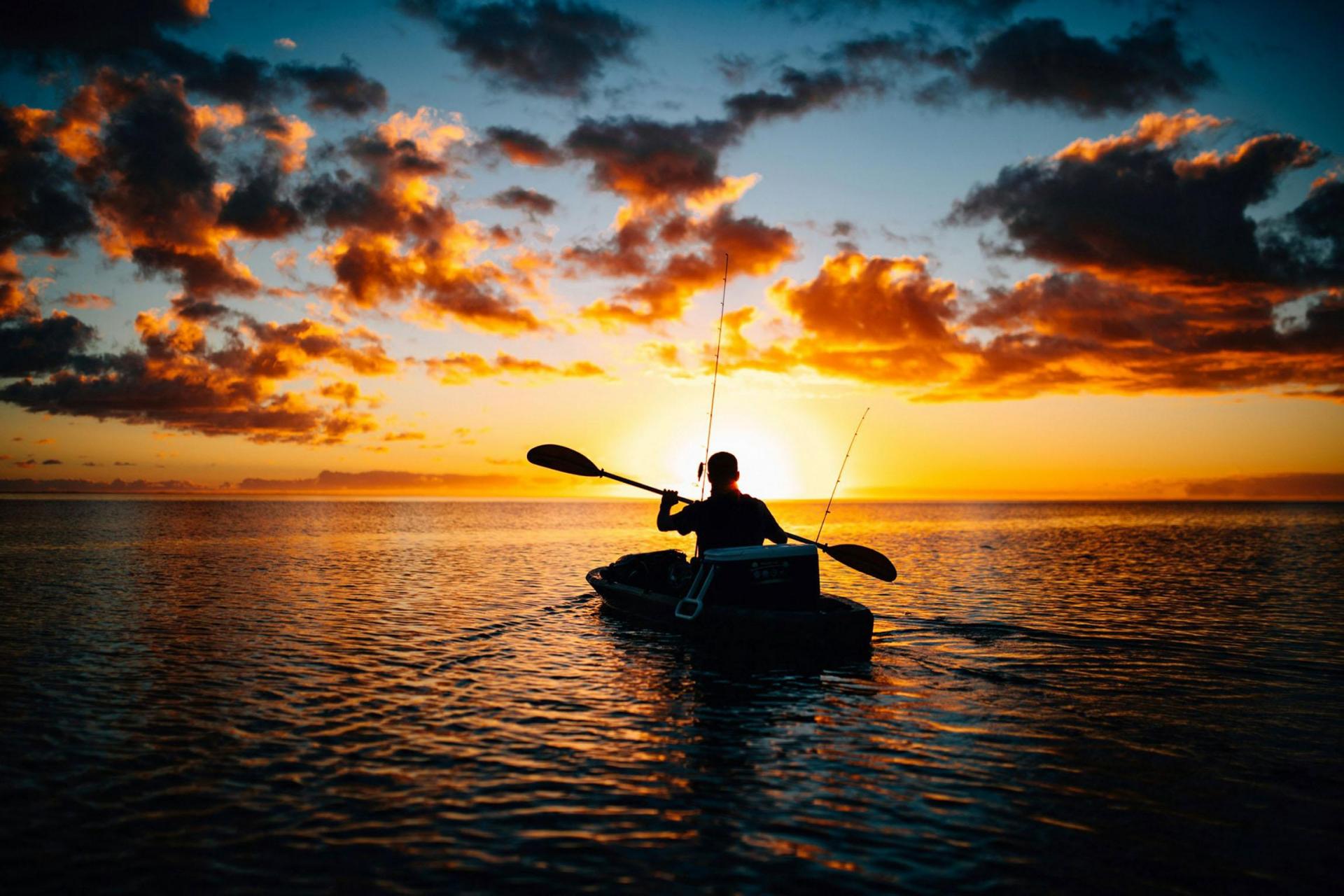 Kayak fishing at sunrise.