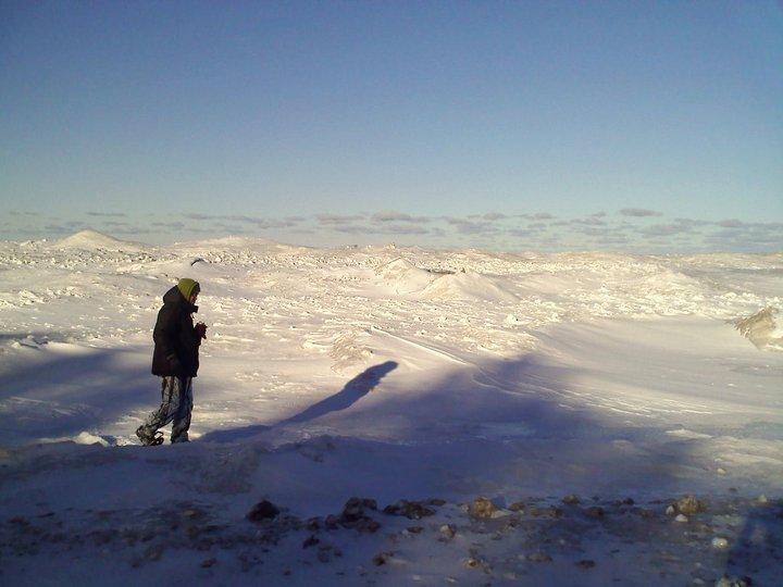 Person snowhoeing in snow