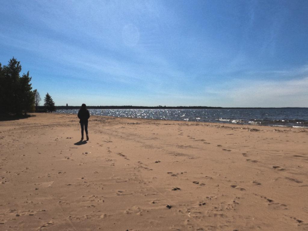 woman standing on a beach