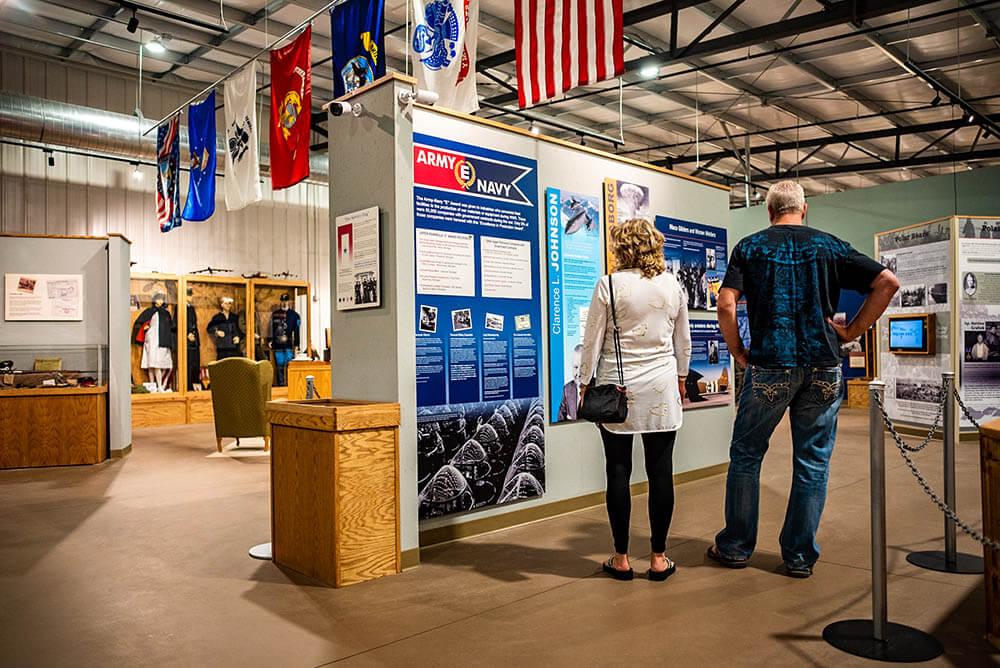 Two people looking at an exhibit in the UP Military Museum