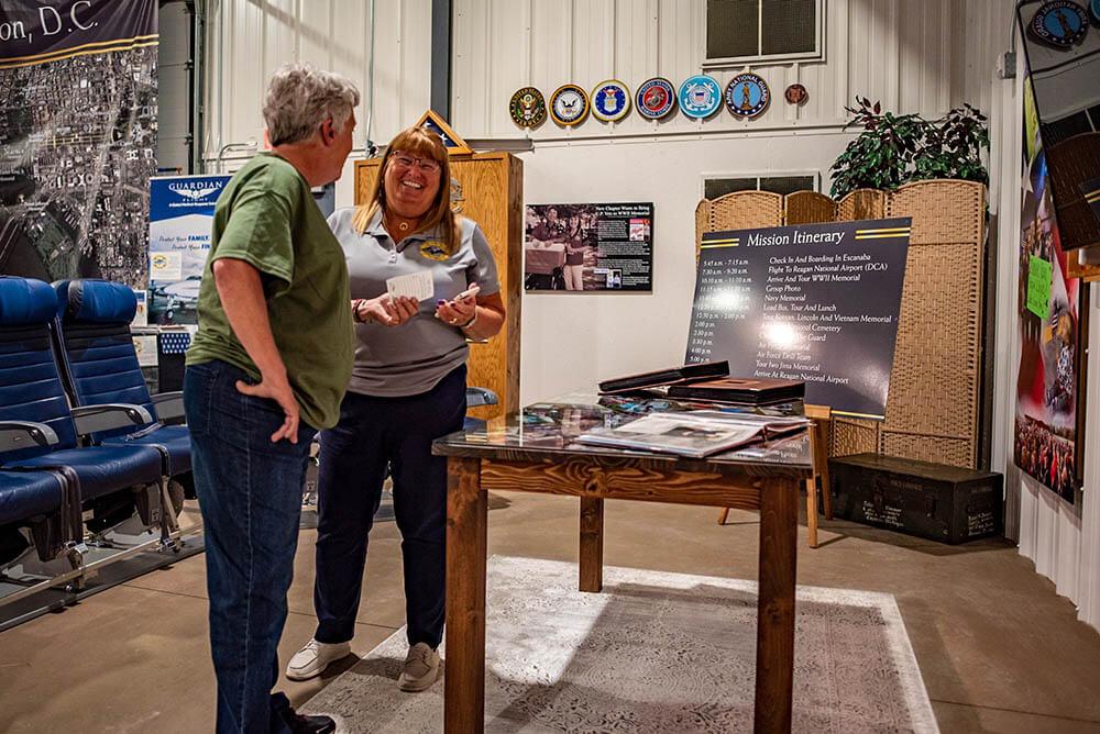 Two people chatting at the UP Military Museum